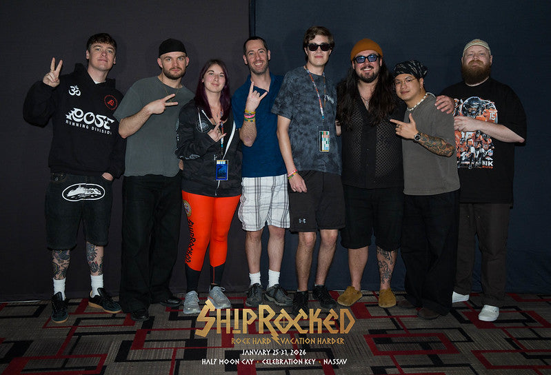 Group of fans posing together for 'ShipRocked' photo op
